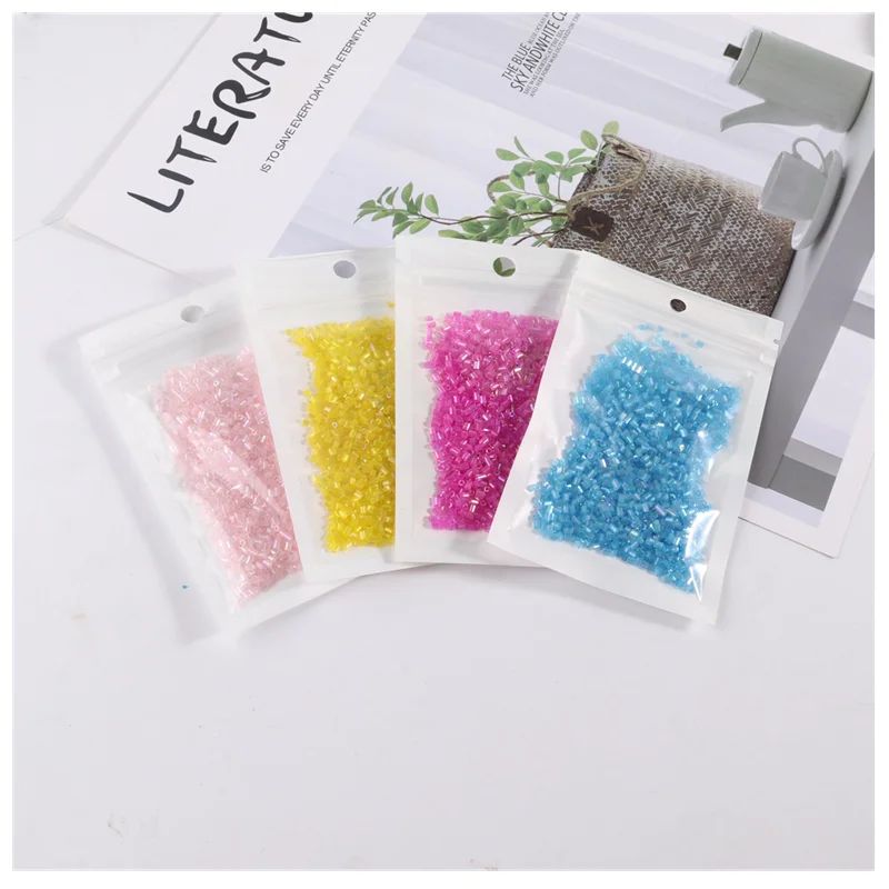 1200 pz/lotto 2 millimetri Brillante Perle di Vetro FAI DA TE Trasparente 11/0 Vetro Bugle Seedbeads Per Le Imbarcazioni Dei Monili Accessori Per