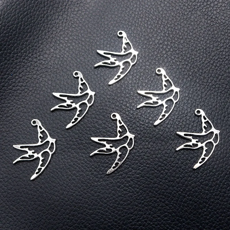 12pcs/lot Silver Plated Hollow Swallow Charm Metal Pendants DIY Necklaces Bracelets Jewelry Handicraft Accessories 35*22mm P450