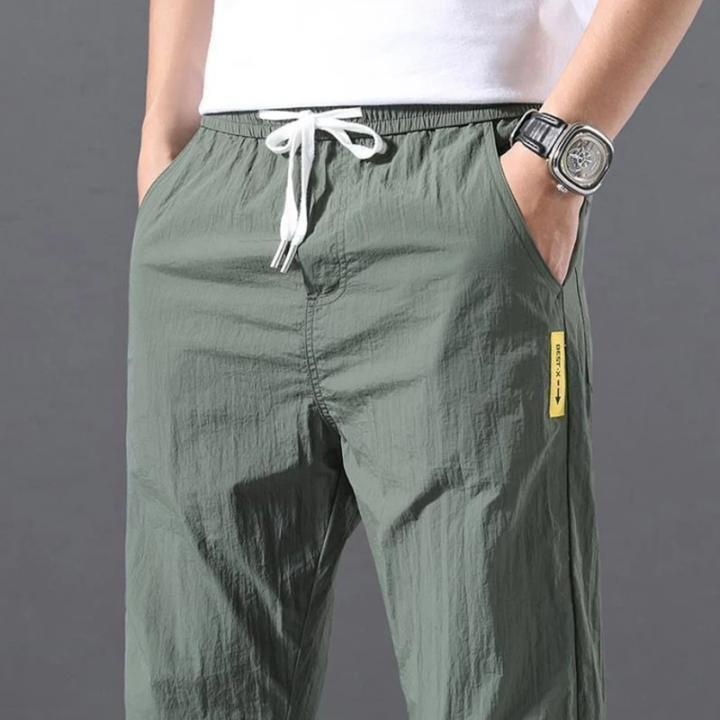 

2021 Summer Men Pants Sports Outdoor Casual Trousers Solid Color Elastic Waist Lightweight Comfortable Male Long Pants Plus Size