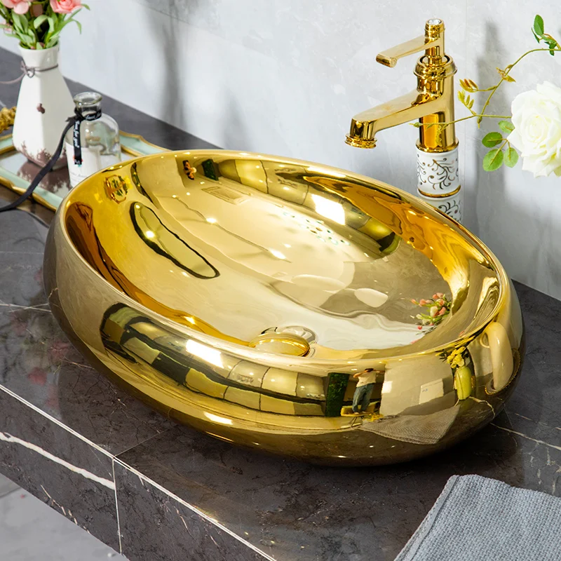 

Ceramic China wash basin Bathroom vessel sinks counter top hand washbasin gold oval bathroom sink