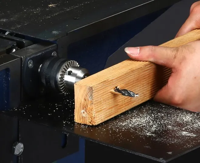 The smallest multifunctional woodworking chainsaw planer 220V 2800r and 1.3KW motor/