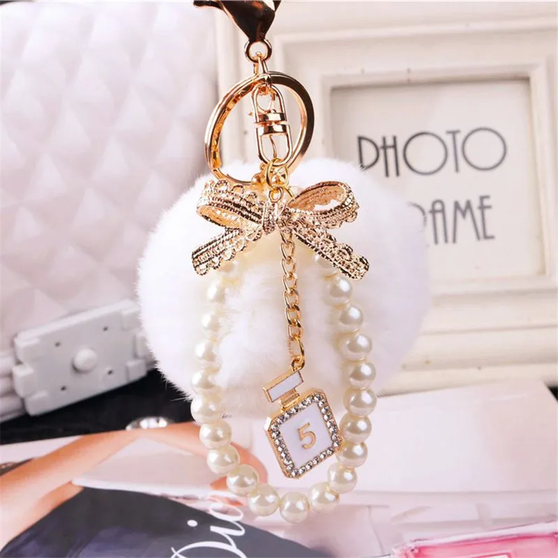 Fashion Faux Fluffy Crystal Bottle Bow Pompom Keychain Pearl Chain number 5 Women handBag Car Key Chain Ring Keychains Jewelry