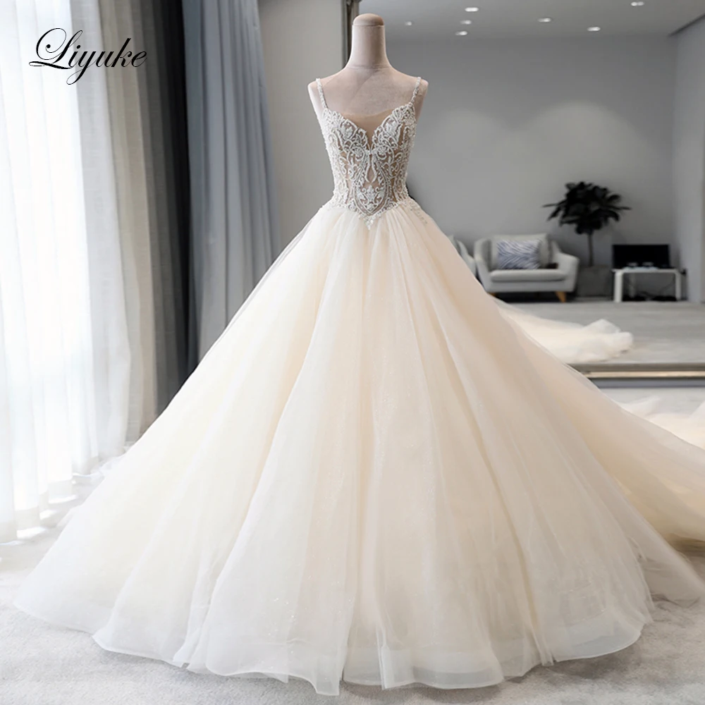 

Liyuke Gorgeous Ball Gown Wedding Dress With Puffy Rulle Skirt Elegant Rhinestones Beads V Neckline Bride Dress