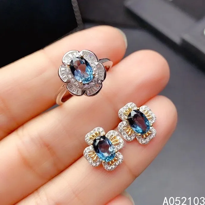 

KJJEAXCMY fine jewelry 925 sterling silver inlaid natural blue topaz Women's simple and generous flower Gem Ring Earring Set sup