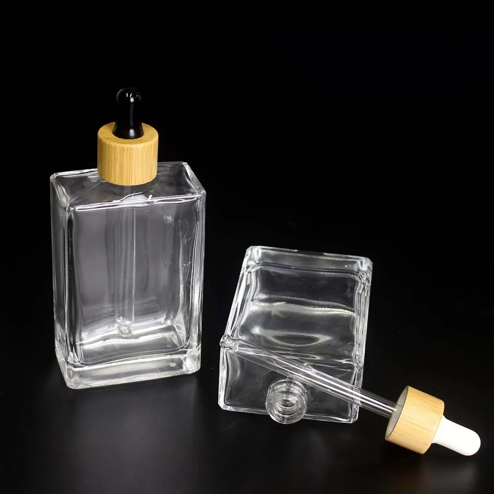 Spot Wholesale 100ml Square GlassTransparent Dropper Bottle Cosmetic Bamboo Cover Essential oil bottle container