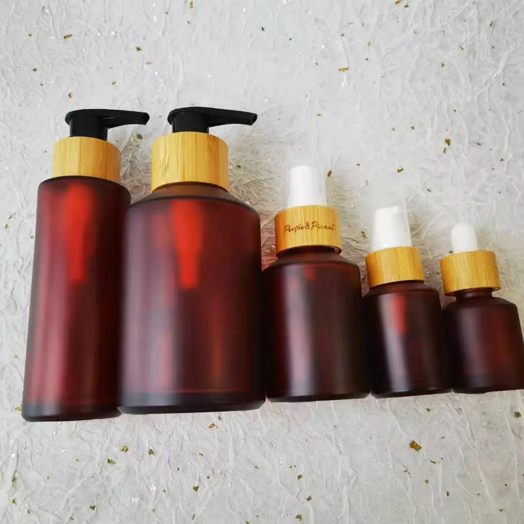 Cosmeticos Lotion Pump Bottle Essential Oil Serum Oblique Shoulder Frosted Amber Glass Dropper Bottles With Bamboo Lid