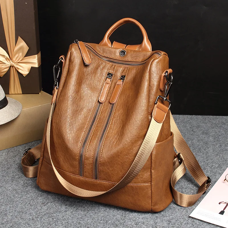 Shoulder bag fashion women backpack bag real leather Multifunctional backpack travel diaper bag with earphone hole