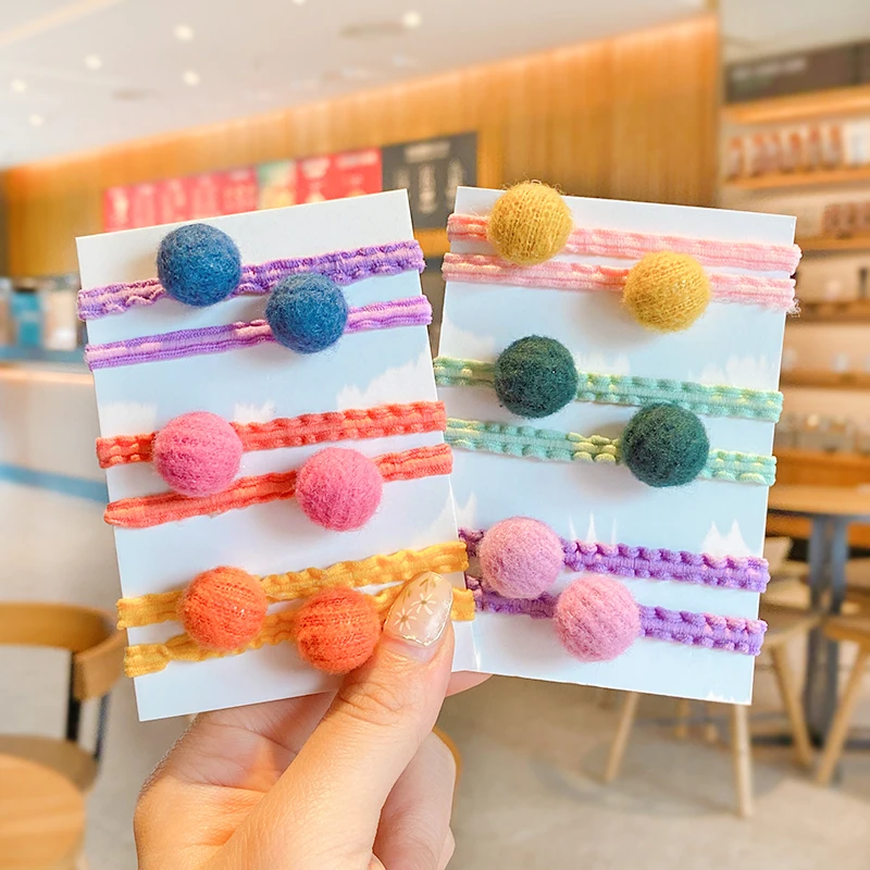 2 шт./компл. дети милые Цвета нейлона с меховыми помпонами для эластичные детские ленты для волос для девочек прекрасный резинка резинки для волос аксессуары