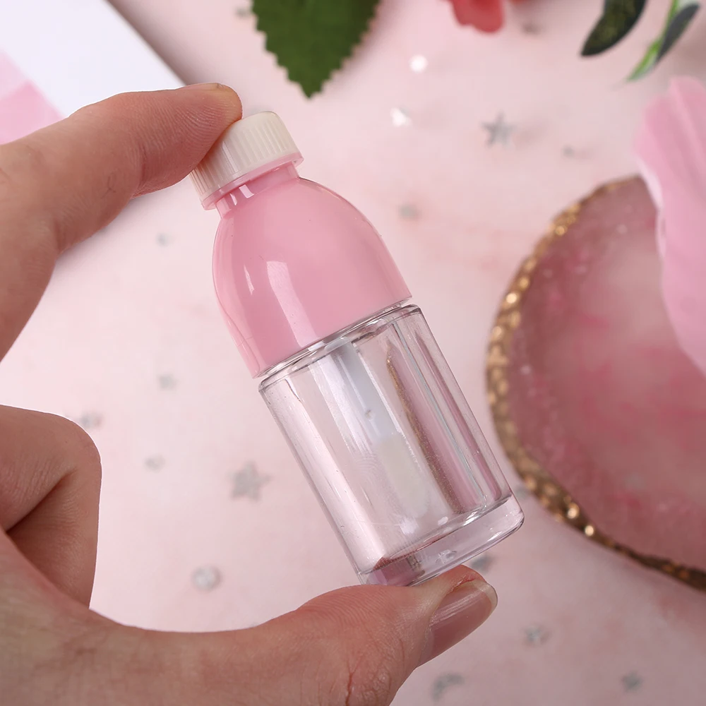 1 Pc bottiglia per bevande rosa a forma di bottiglia vuota lucidalabbra contenitori trasparenti Mini bottiglie ricaricabili per balsamo per labbra con inserti in gomma nuovo