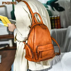 PNDME-mochila de piel de vaca de primera capa para mujer, morral de cuero genuino para fiesta de fin de semana, moda informal para exteriores