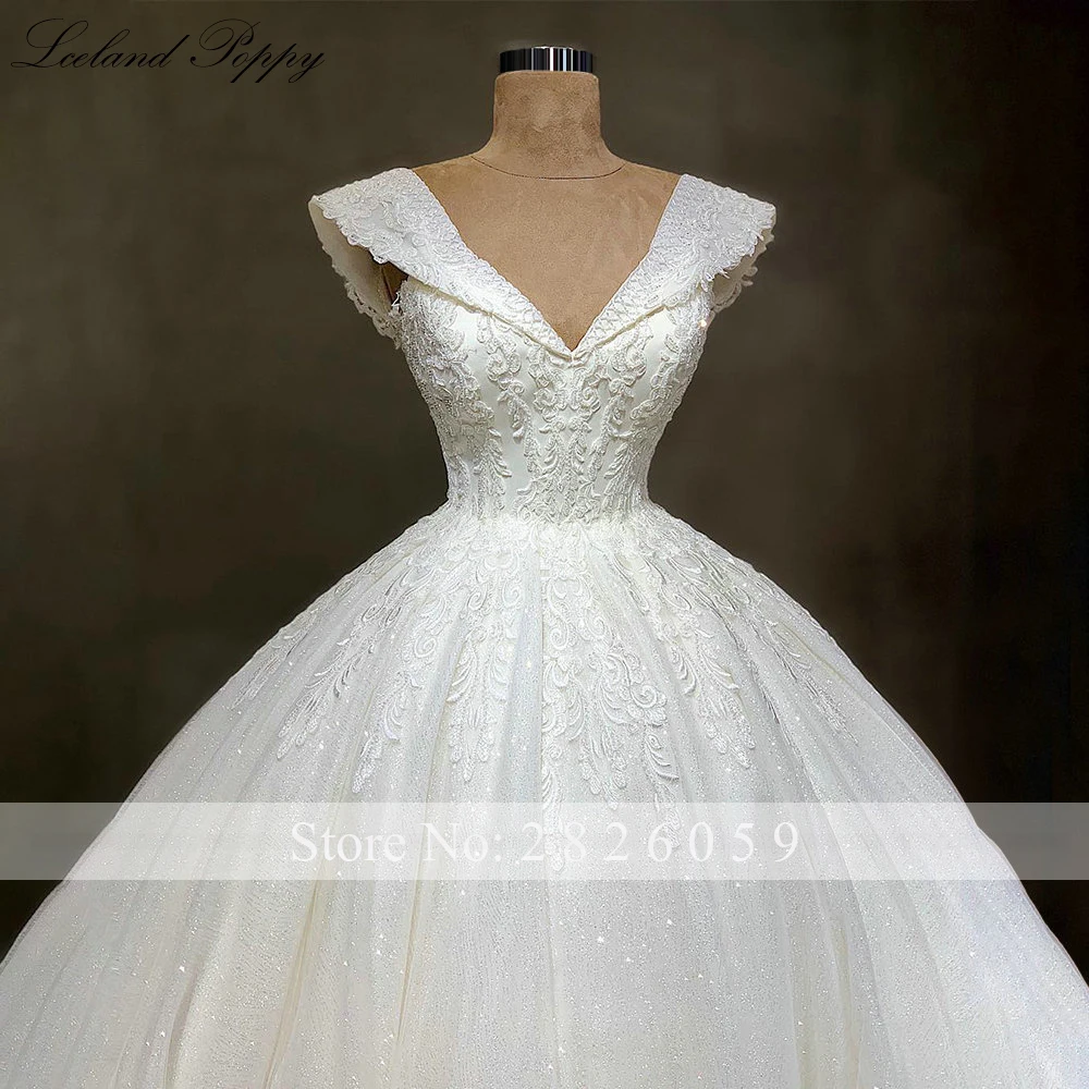 Lceland Poppy Customized V Neck Ball Gown Shiny Wedding Dresses Cap Sleeves Beaded Lace Appliques Bridal Gowns with Sweep Train