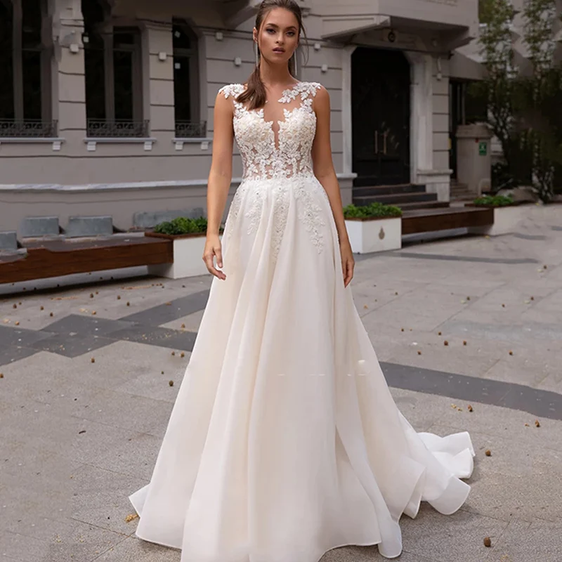 

Graceful Lace Wedding Dresses Sleeveless Gowns Illusion Jewel Neck Appliqued Beaded Bridal 2023 On Sale