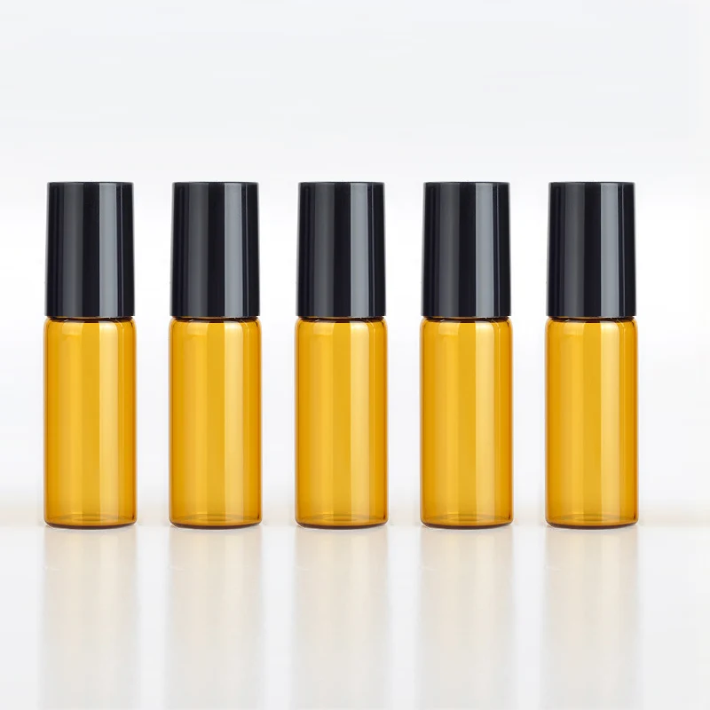 10 adet/100 adet/grup 5ml taşınabilir Amber cam rulo Rollerball uçucu yağ şişeleri doldurulabilir parfüm şişesi kozmetik konteyner