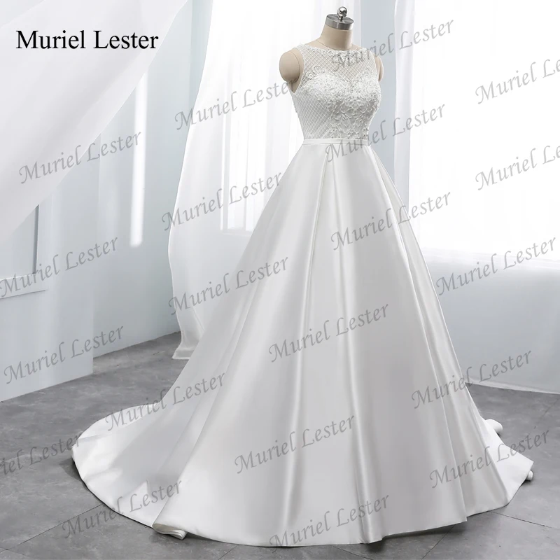 Robe de mariée trapèze en Satin moderne, personnalisée, avec des cristaux et des Appliques de perles, effet d'illusion, col rond, sans manches