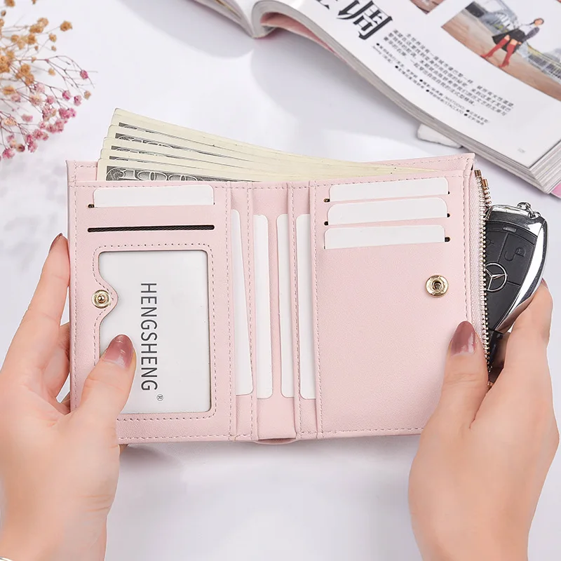 New ladies wallet Japanese and Korean buckle simple multi-card two-fold change wallet multi-function card package