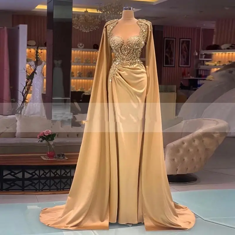 Luxury Gold Formal Evening Dresses With Cape Crystal Beaded Long Sleeves Ruched Satin Robe de mariée Mermaid Prom Party Gowns