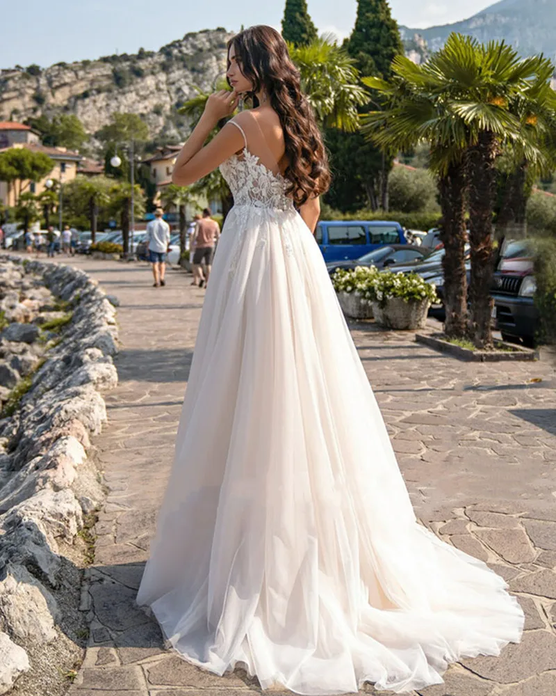 Abito da sposa elegante di lusso con scollo a o 2024 Appliques in pizzo a trapezio manica corta bottone senza schienale Organza abito da sposa Robe De Mariée