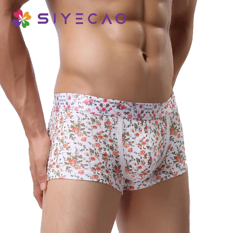 Ropa interior Sexy para hombre, Bóxer con estampado de flores, bragas de cintura baja, Calzoncillos de algodón con bolsa convexa en U