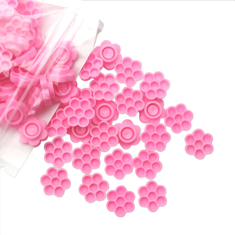 100 個まつげ接着剤ホルダーカップラッシュリフティング接着剤収納ツールまつげエクステンションブロッサム遅延容器メイクアップアクセサリー