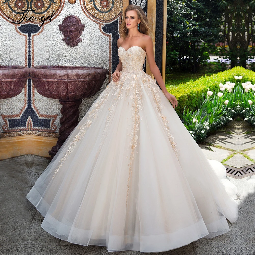 

Traugel Sweetehart A Line Lace Wedding Dresses Demure Applique Sleeveless Backless Bride Dress Sweep Train Bridal Gown