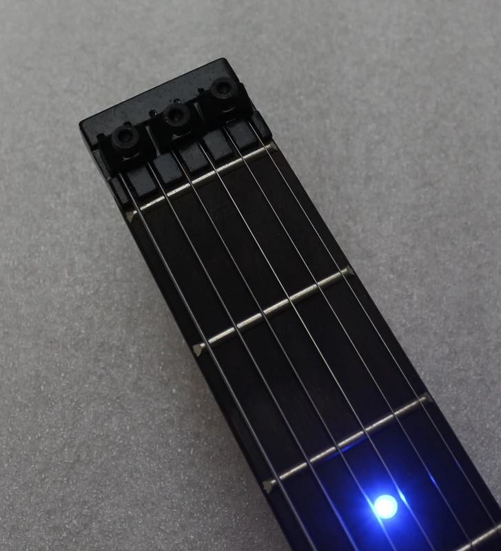 good quality headless portable travel acrylic mini electric guitar with blue light