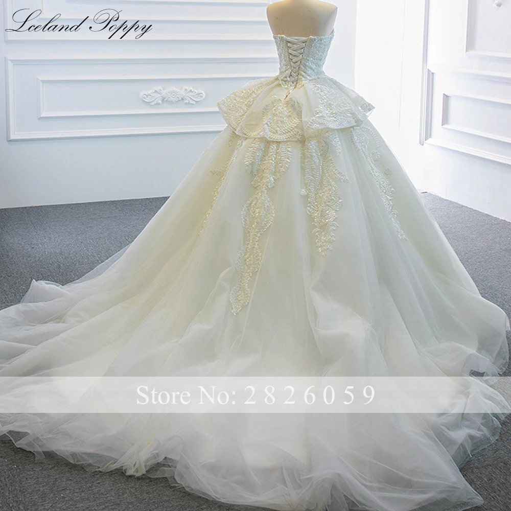 IJsland Poppy op maat gemaakte strapless baljurk kanten trouwjurken mouwloze kralen vloerlengte gelaagde bruidsjurken