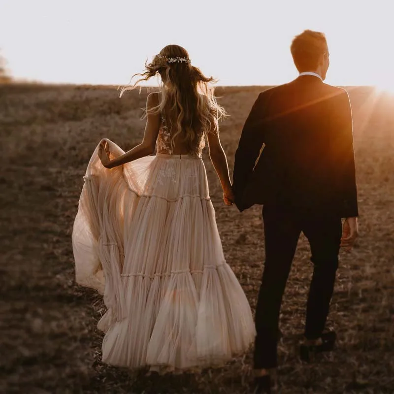 Vestidos De novia bohemios con cuello en V profundo, sin mangas, con volantes De tul, color champán, estilo campestre