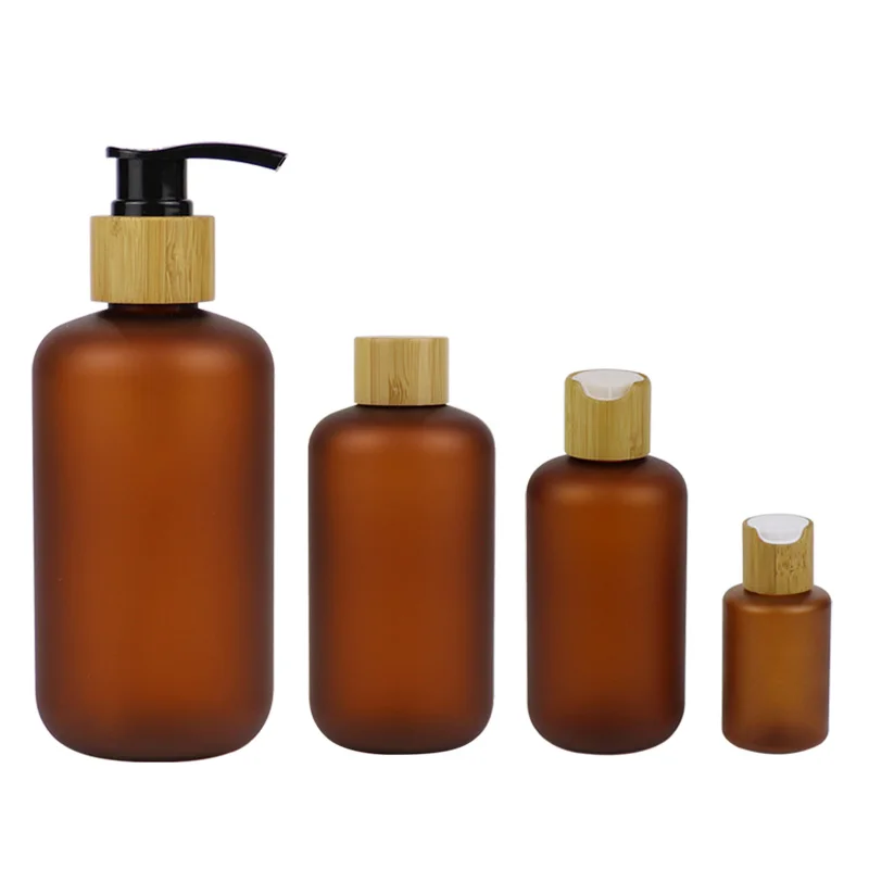 Bottiglia in plastica PET ambrata smerigliata con coperchio in bambù per cosmetici Bottiglie di toner in plastica Pompa Lozione Shampoo 60ml 120ml 250ml 500ml