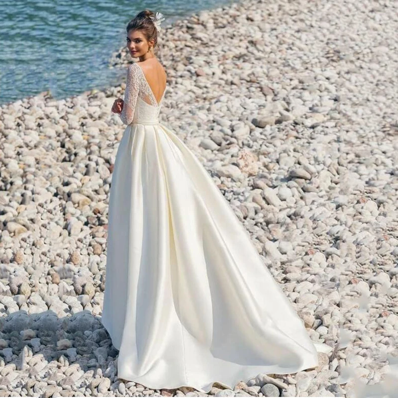 Moderne Langen Ärmeln Spitze Satin Hochzeit Kleider V-ausschnitt A-linie Backless Strand Brautkleid African Hochzeit Kleider trouwjurk 2022