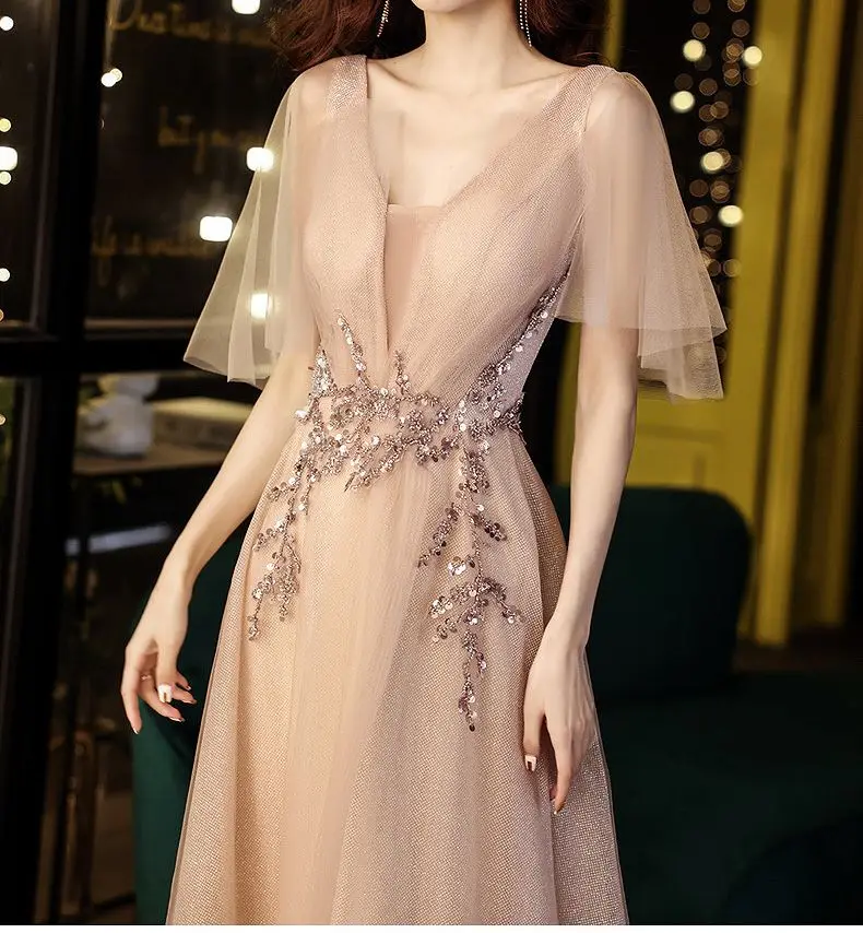 Luxury Champagne Prom Dress A Line Deep V-Neck Floor Sequined Shining Dubai Wedding Banquet Party Evening Gowns With Cap Sleeves