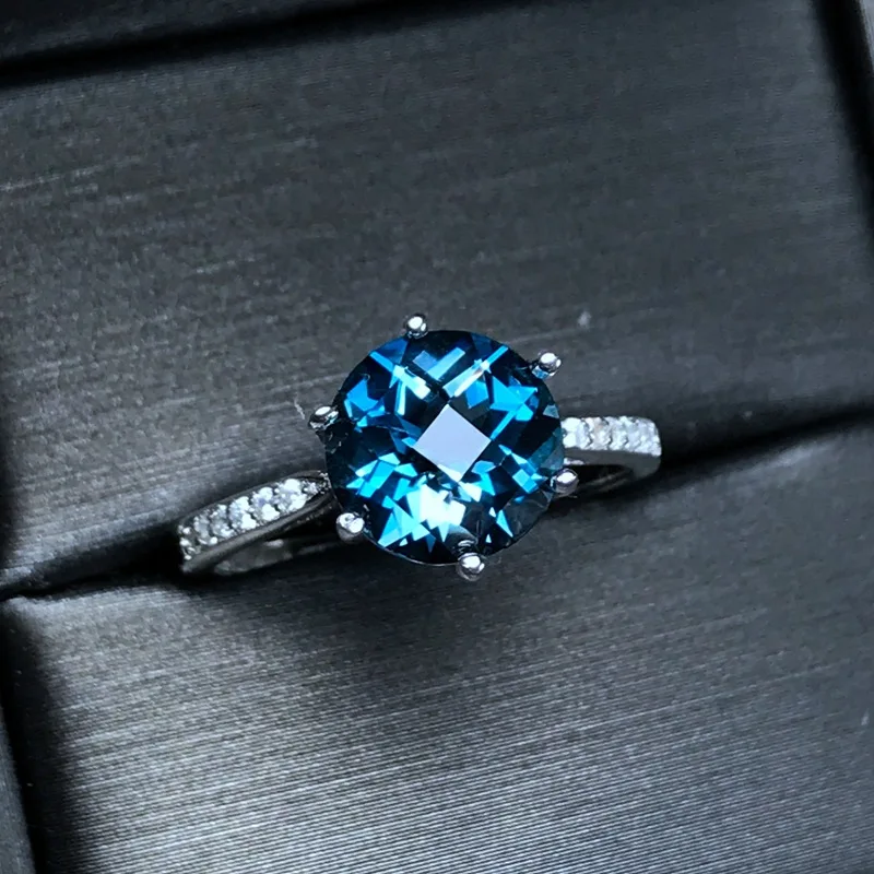 

Supply 925 Sterling Silver White Gold Plated Inlaid With Full Clean Body Shiny Lattice Surface Natural London Blue Topaz Ring