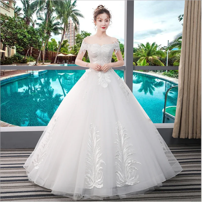 

Designer Wedding Dress Off Shoulder boat neck Short Sleeves Empire Net Applique Paillette lace up Bridal Ball Gown