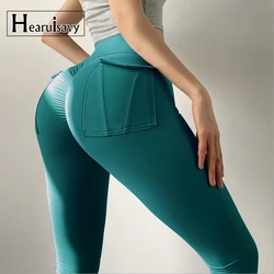 Nuovi Leggings sportivi a vita alta per le donne palestra Squat Training Wear Femme Naked Feeling Pocket pantaloni elastici Push Up Hip Yoga