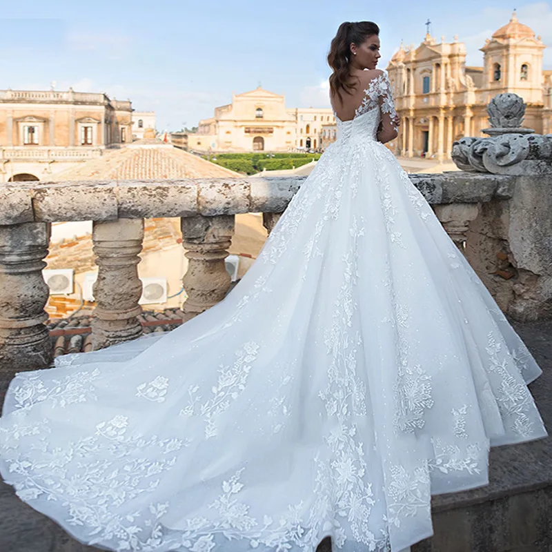 Laço de luxo decalque manga longa a linha vestido de noiva 3d apliques sem costas rendas acima vestido de casamento da igreja trem real