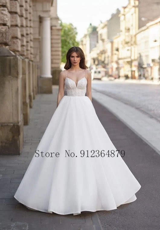 Sexy Spaghettibandjes Kant Applicaties Kralen Trouwjurk 2022 Netting Bruidsjurk V-hals Vloerlengte Backless vestido