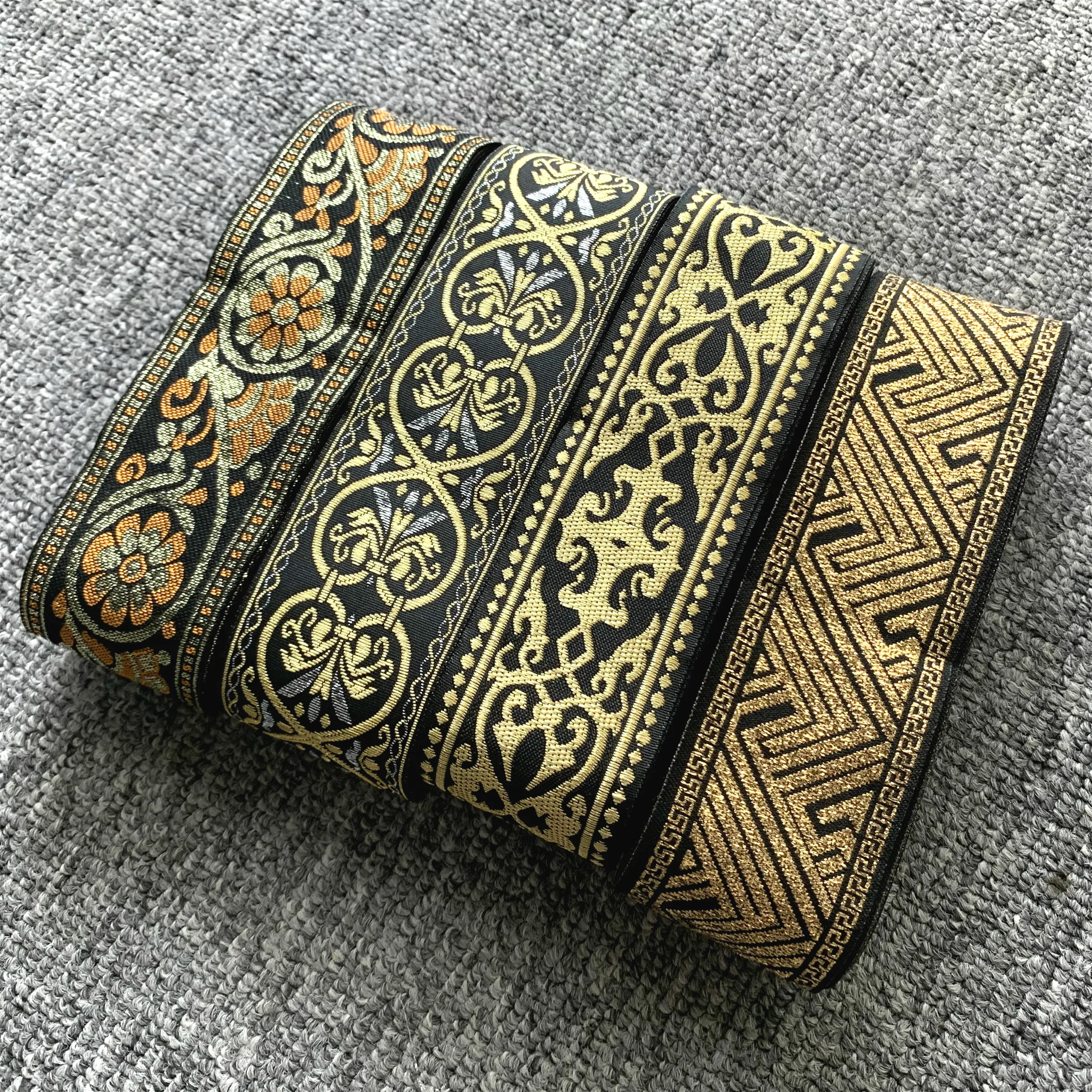 10 yardas/lote de aproximadamente 5cm de ancho, cinta Jacquard tejida, adornos de flores, patrón dorado negro para cortina y accesorio de ropa ZERZEEMOOY