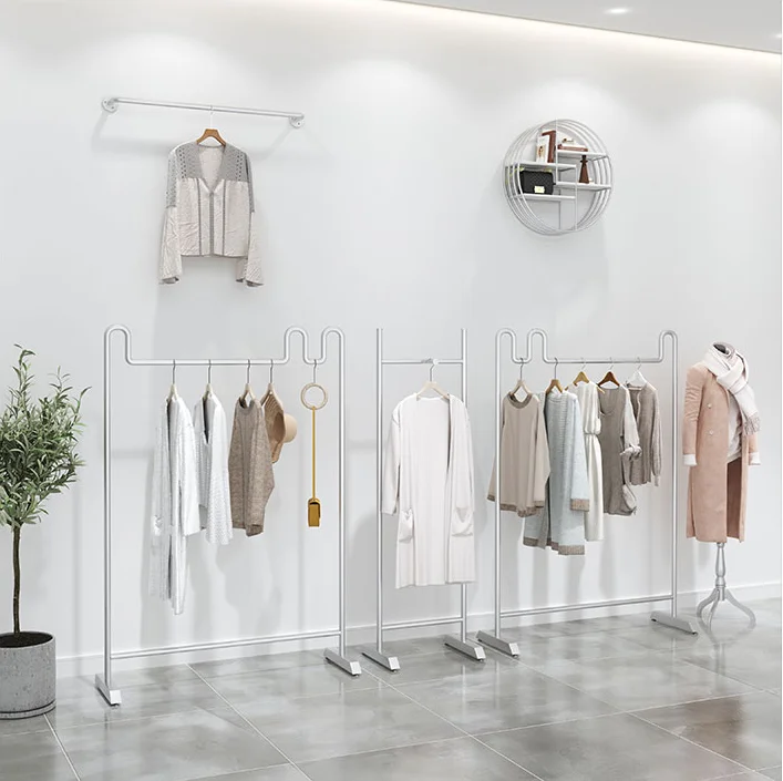 

Women's clothing store shelf display shelf floor type Nordic silver iron clothing hanger simple middle island display shelf