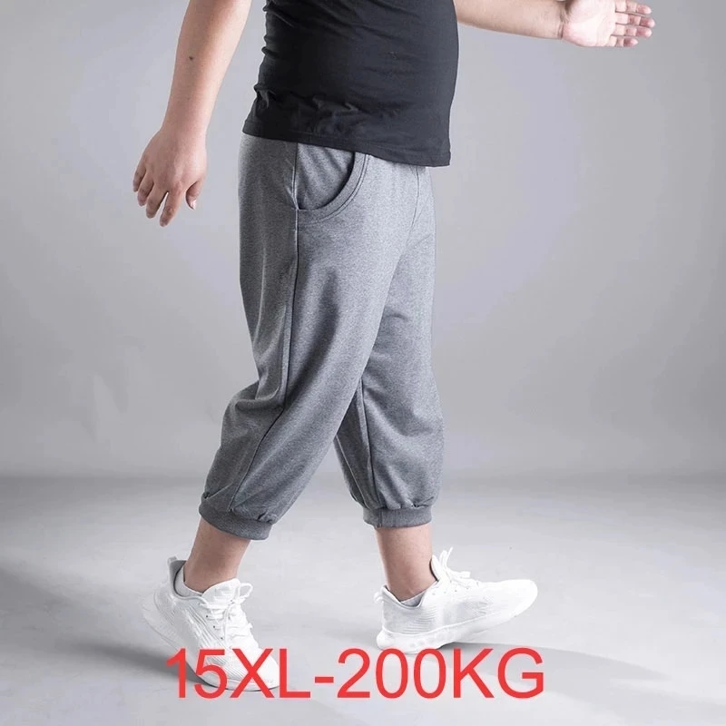 

High quality summer men sports shorts Loose 14xl 15xl Comfortable Breathable elasticity thin knee length shorts 200KG gray 66 70