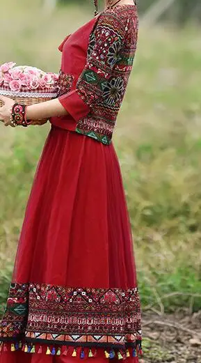 تنورة شبكية بشرابة بدلة حمراء في عطلة الربيع والخريف على الطراز الوطني مكونة من قطعتين ملابس نسائية جديدة من القطن والقنب