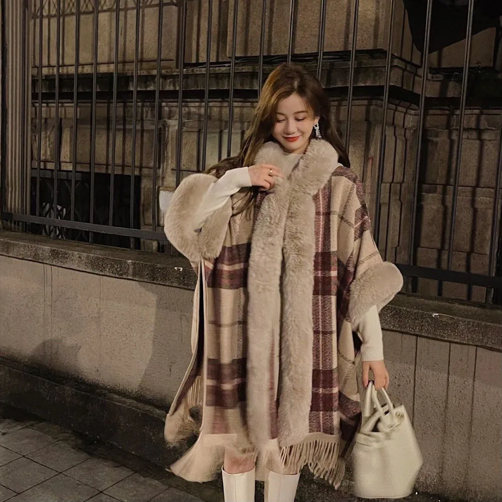 Winter 2023 Faux Fox Fur Hooded Poncho Woolen Coats Women Tassel Cloak Warm Outwear Winter New Plaid Cape For Women Loose Coat