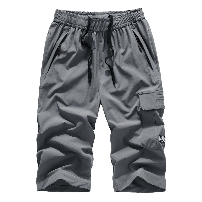 

L to 8XL Breathable Sweatpants Men Summer Big Size Sandy Beach Surf 3/4 Trousers Loose Polyester Multi Pocket Jogger Gym Pant