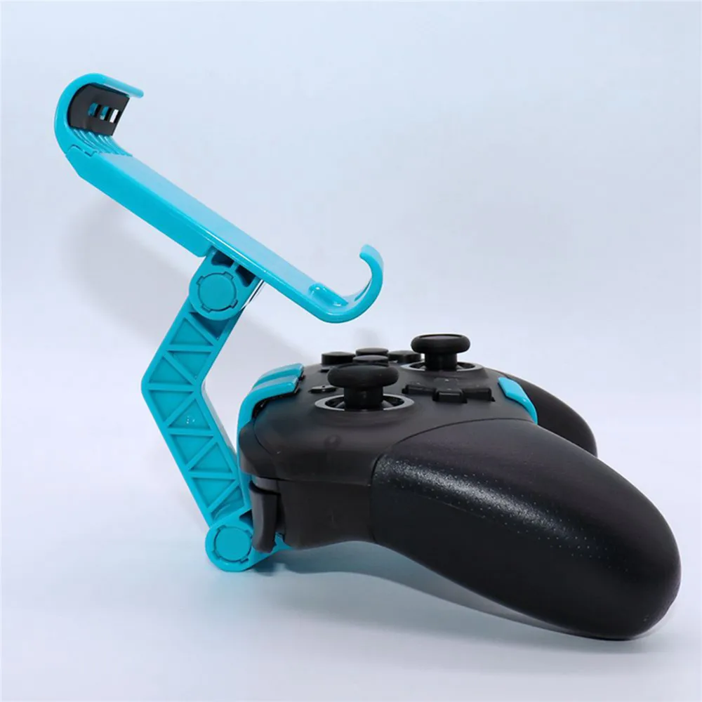 ปรับจอยควบคุมเกมสำหรับ Switch/ Lite อุปกรณ์จับยึดเล่นเกมผู้ถือจับยึดแบบหนีบขาตั้งจอยควบคุมเกมอุปกรณ์เสริม