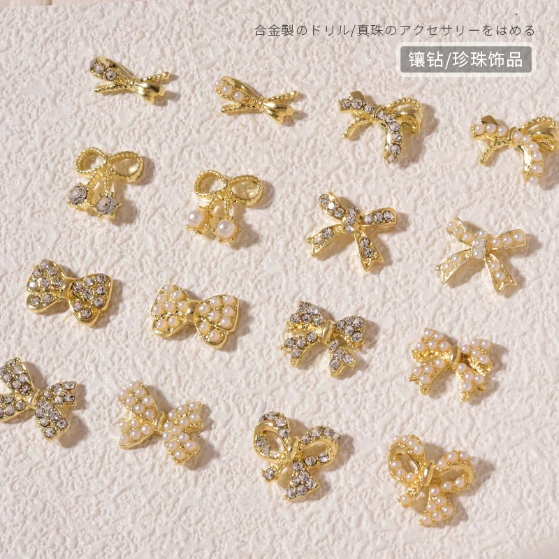 

Nail Art Pearl Butterfly Combined With Gold Jewelry Full Of Diamonds Metal Bow Tie Pearl Decoration Nail Stickers Diamond