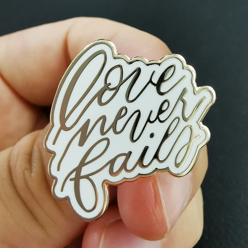 Love Never Fails Gold and White Lapel Pin Christian Quote Badge lovely daily reminder of encouragement