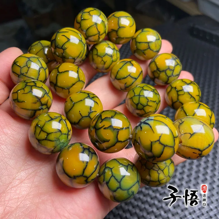 The manufacturer directly supplies Brazilian yellow dragon scale agate 20mm men's hand string dragon pattern agate to play with