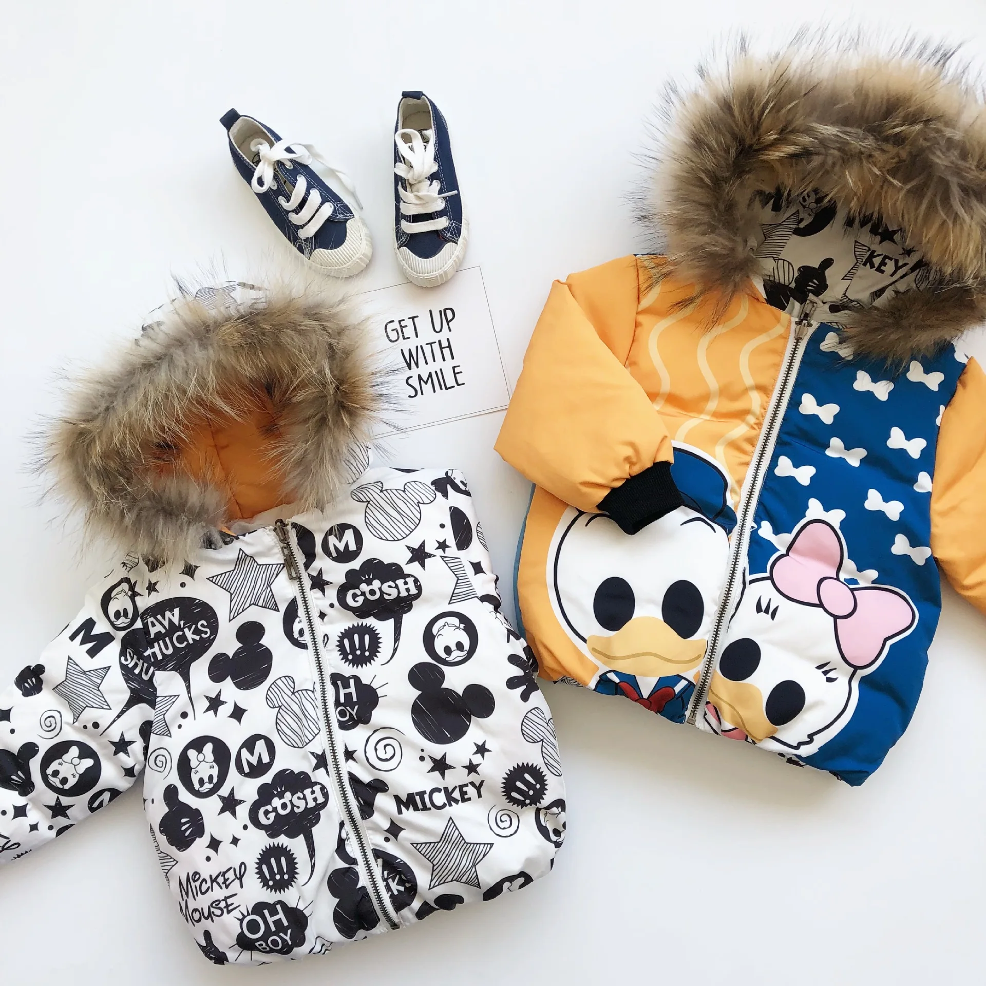 

Tonytaobaby Winter Wears New Baby Boys and Girls Wearing Double-sided Down Jacket with A Duck Pattern To Keep Warm