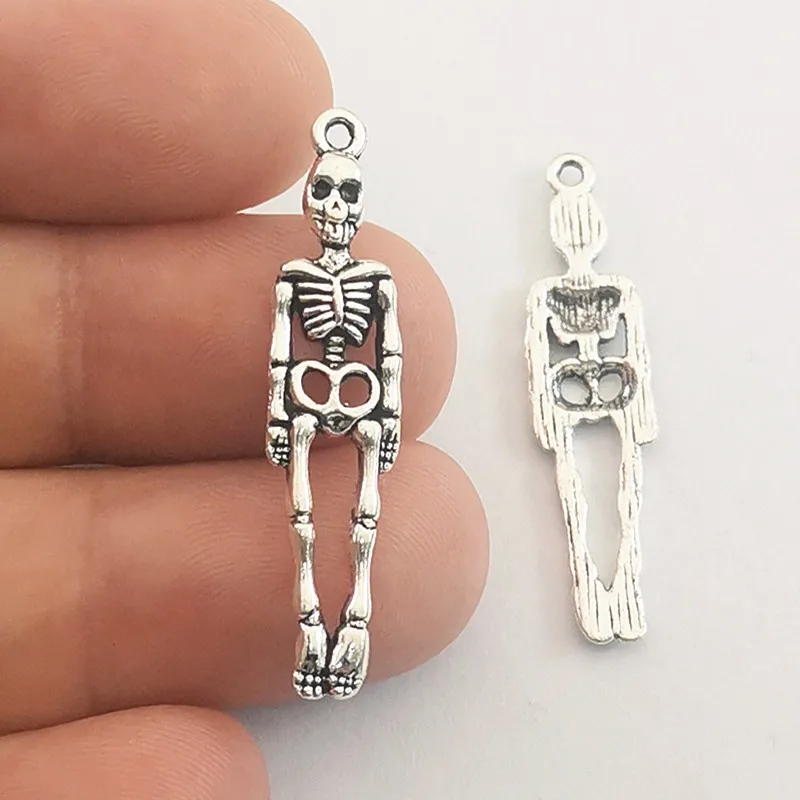 JINDINSP 12pcs Charms Skull Skeleton Man 39x9mm Antique Silver Color Plated Pendants Making DIY Handmade Tibetan Finding Jewelry