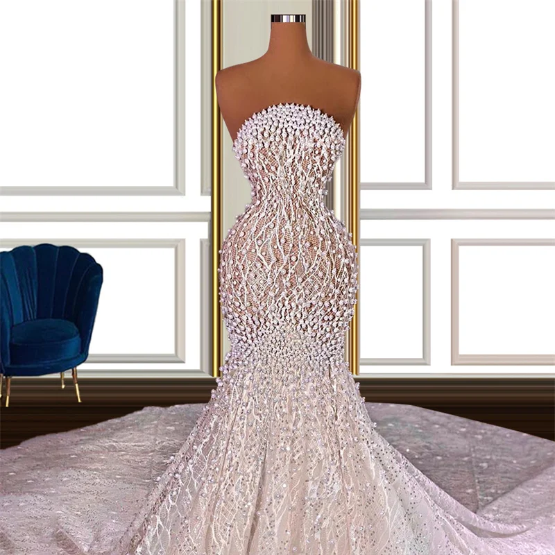 

Luxurious Pearls Wedding Dresses Lace Appliques Sleeveless Bridal Gowns Custom Made Beads Sweep Train Vestido de novia