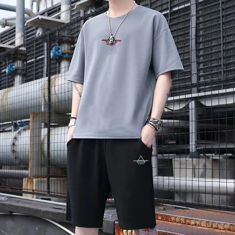 

Men Korean Fashion Short Sleeve Tracksuit Summer Two Pieces Set Tshirts And Short Pants For Male Causal Loose Sports Set Clothes