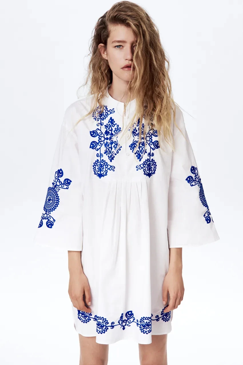 

Nice new positioning embroidered mini dress